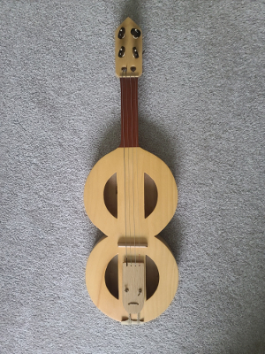 front of 4 stringed Medieval Viol based on portal at Cathedral Sainte-Marie