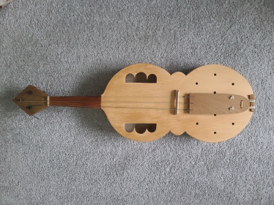 front of 3 stringed Medieval Viol based on portal at Santiago de Compostella